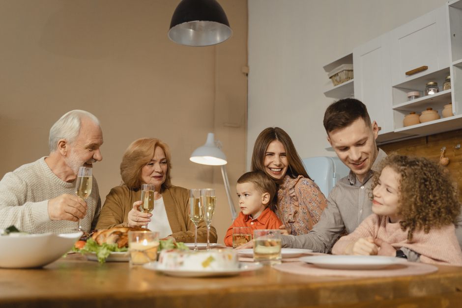 Family eating a meal together at the table